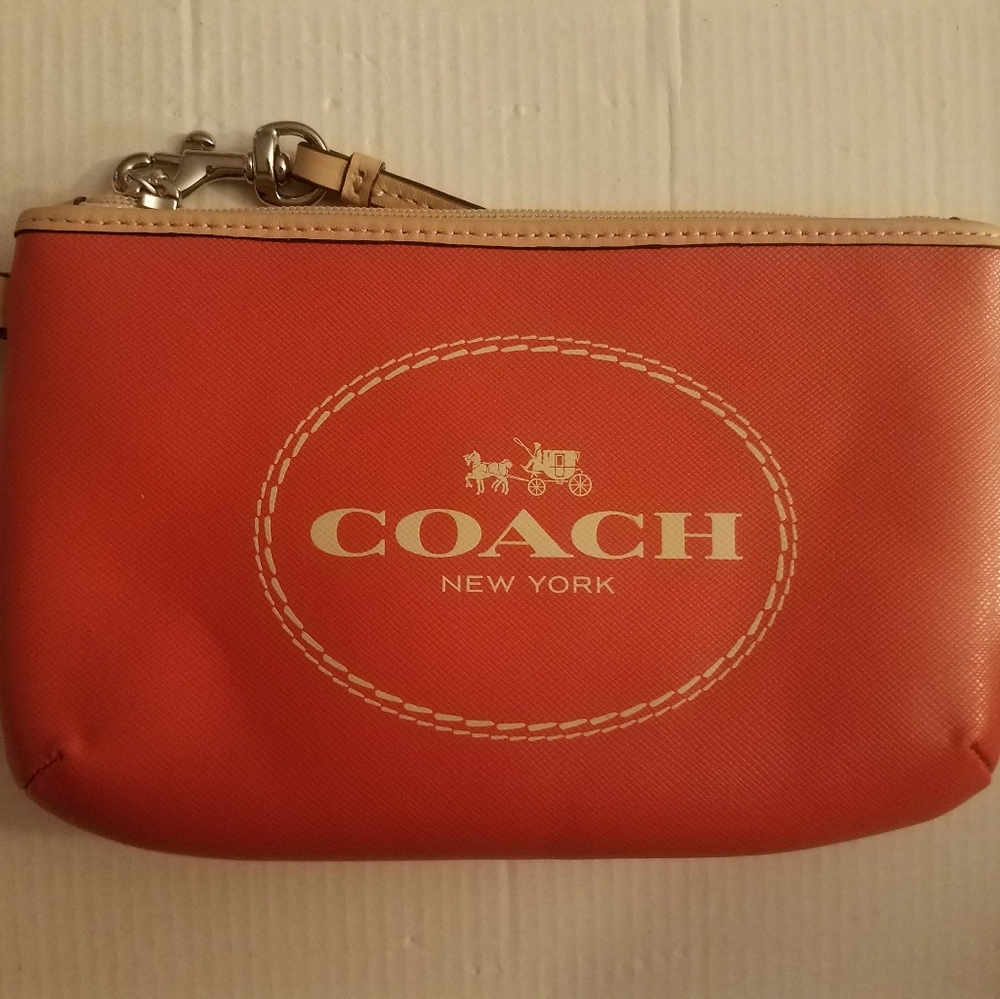 Coach horse and carriage leather medium wristlet